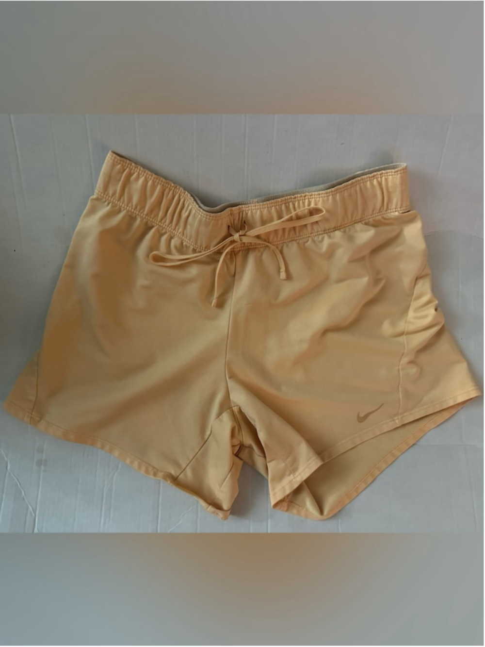 Nike Women’s Peach-Gold Athletic Shorts